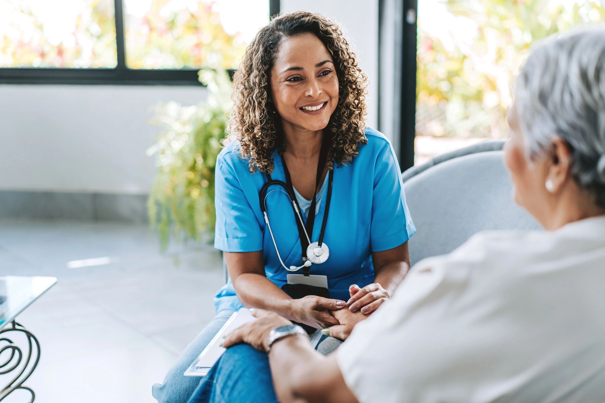 Healthcare professional with elderly patient